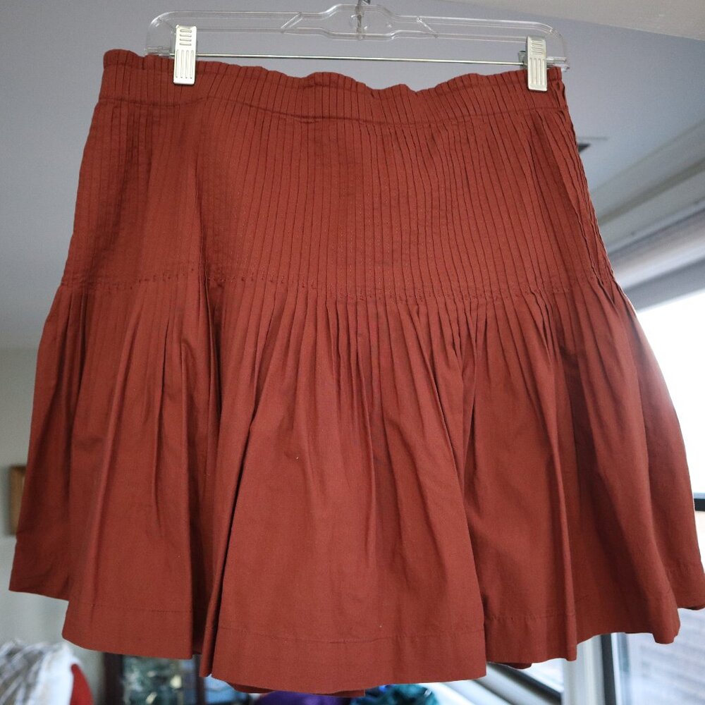 Anthropologie rust-colored mini skirt